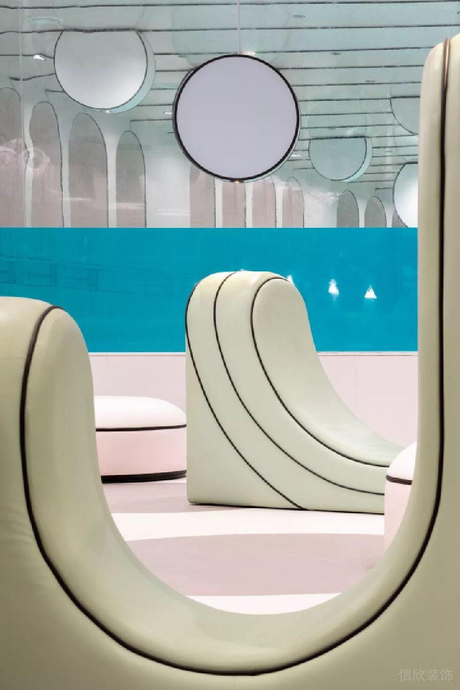 綠色沙發(fā)半墻裝修設(shè)計等待區(qū)域