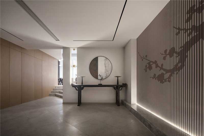 深圳龍華區(qū)現(xiàn)代中式風(fēng)格舊房裝修改造完工后實(shí)景圖玄關(guān)