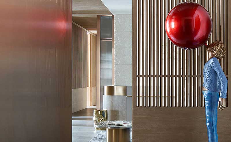 深圳龍華觀瀾新中式辦公室裝修入口處木格柵屏風 深圳龍華觀瀾新中式辦公室裝修入口處木格柵屏風