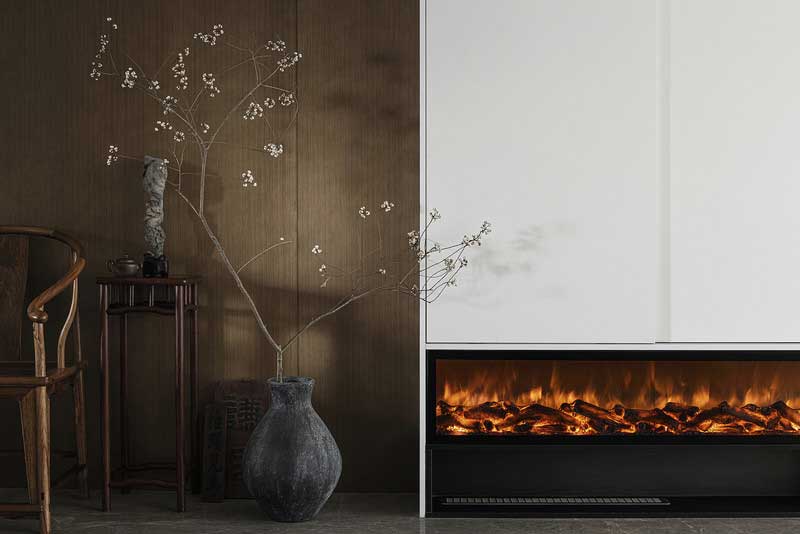 現代壁爐的應用為空間帶來了一抹亮色，活潑跳躍的火苗，讓人在平靜中涌起濃濃暖意。