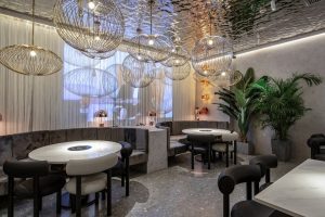 深圳福田天健時尚新天地輕奢風格火鍋店裝修案例卡座用餐區效果圖