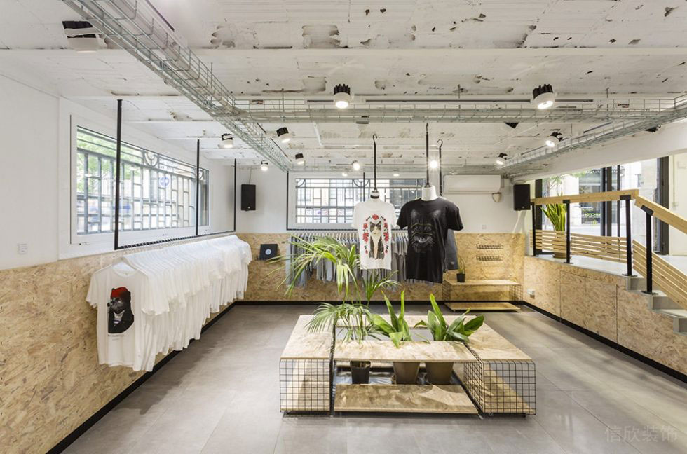 工業(yè)風(fēng)服裝店裝修粗礦的中島柜設(shè)計