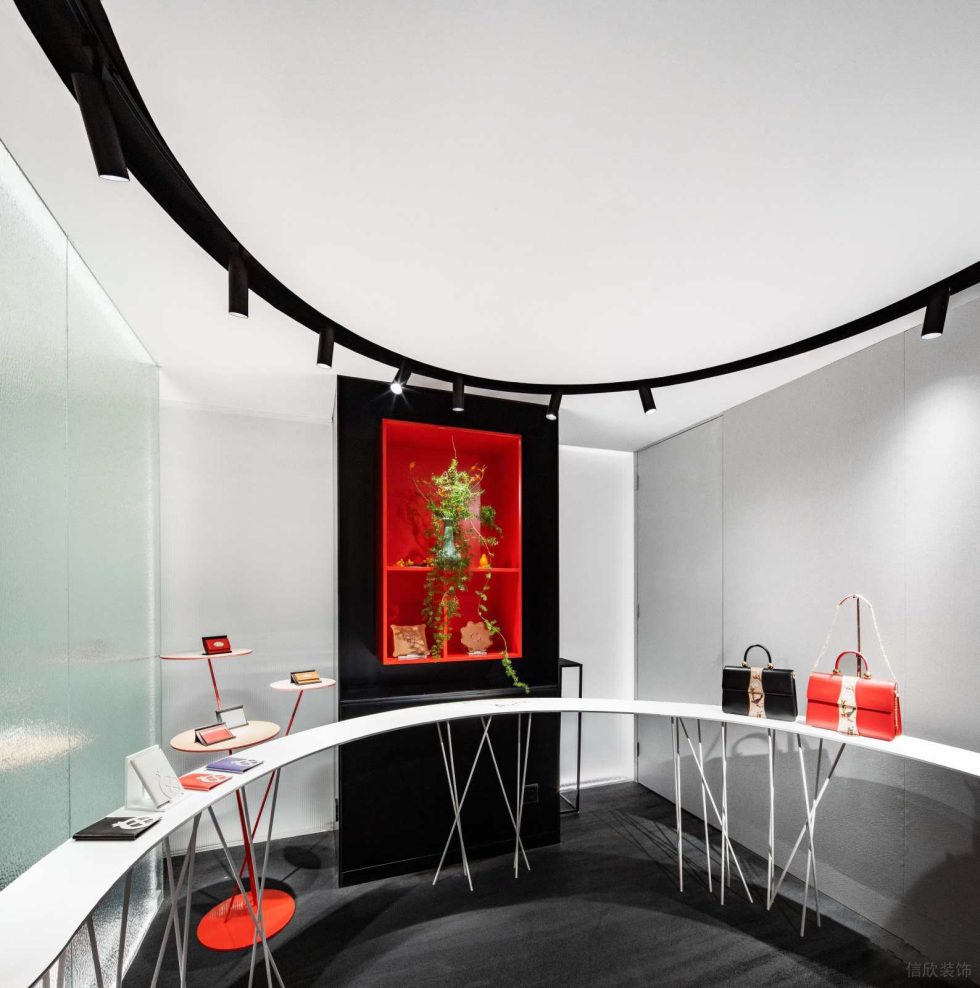 深圳市福田中心區現代風皮革藝術形象店裝修設計-黑色弧形軌道燈 深圳市福田中心區現代風皮革藝術形象店裝修設計-黑色弧形軌道燈