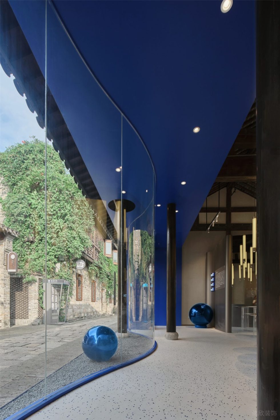 深圳市南山區后海taic工藝品店裝修設計實景圖-弧形透明玻璃落地窗 深圳市南山區后海taic工藝品店裝修設計實景圖-弧形透明玻璃落地窗