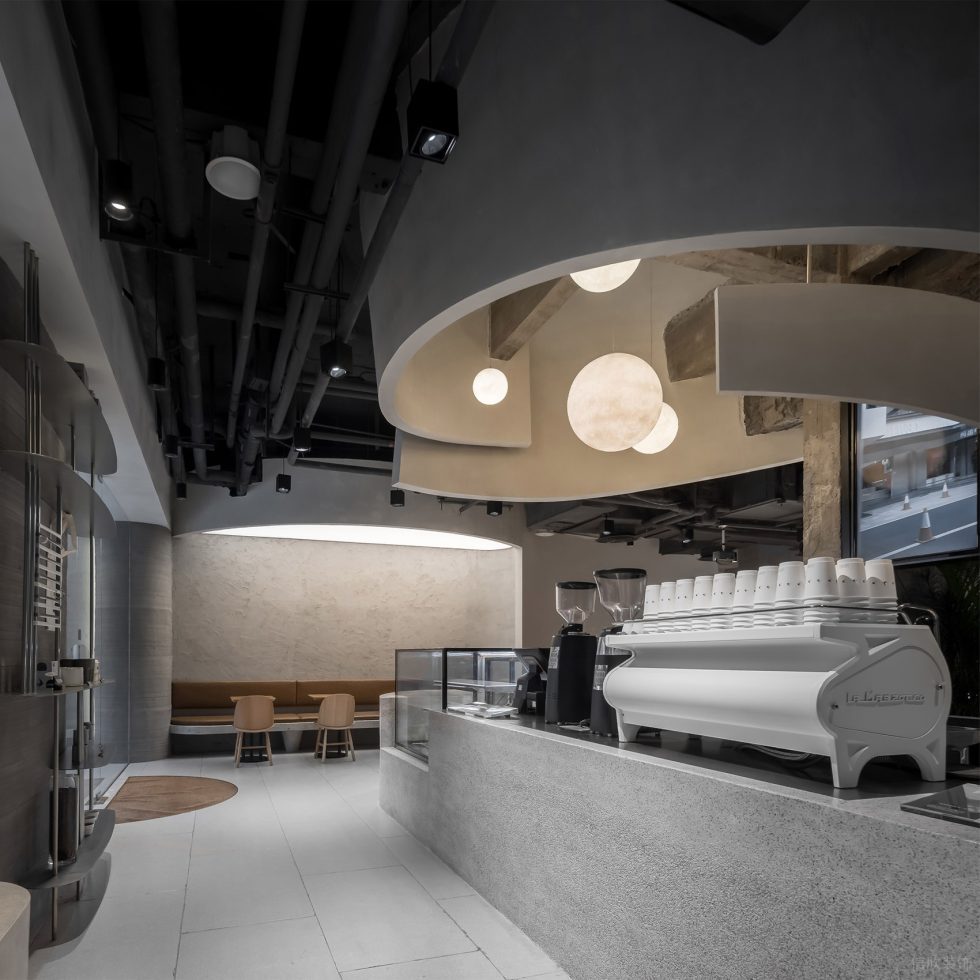 工業(yè)簡約風(fēng)咖啡店入口吧臺區(qū)裝修實(shí)景圖