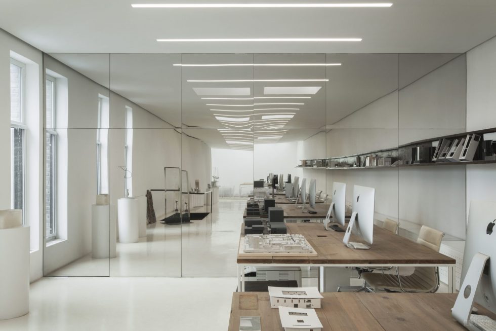 素雅極簡風辦公室裝修設計鏡面不銹鋼背景墻 素雅極簡風辦公室裝修設計鏡面不銹鋼背景墻