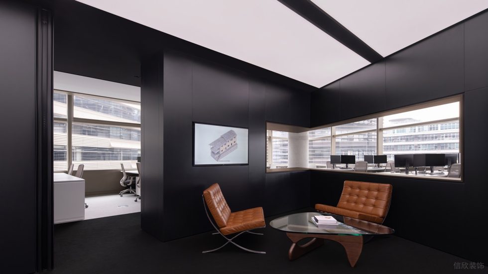 黑白色極簡(jiǎn)風(fēng)辦公室裝修設(shè)計(jì)黑色休閑接待區(qū)